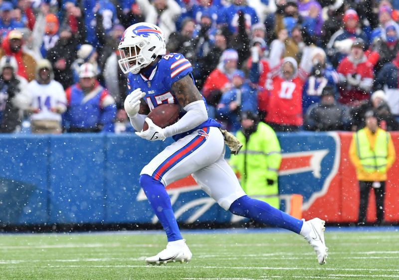 Nov 13, 2022; Orchard Park, New York, USA; Buffalo Bills cornerback Christian Benford (47) returns an interception in the first quarter against the Minnesota Vikings at Highmark Stadium. Mandatory Credit: Mark Konezny-USA TODAY Sports