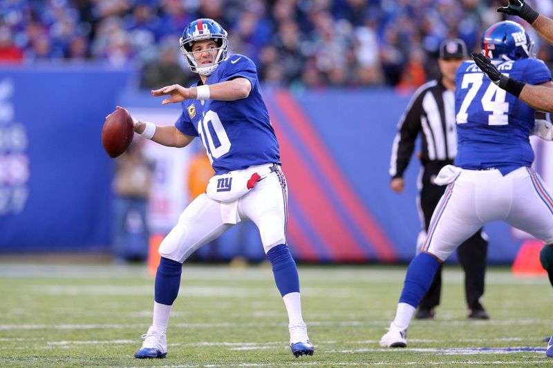 Nov 6, 2016; East Rutherford, NJ, USA; New York Giants quarterback Eli Manning (10) drops back to pass against the Philadelphia Eagles during the third quarter at MetLife Stadium. Mandatory Credit: Brad Penner-USA TODAY Sports