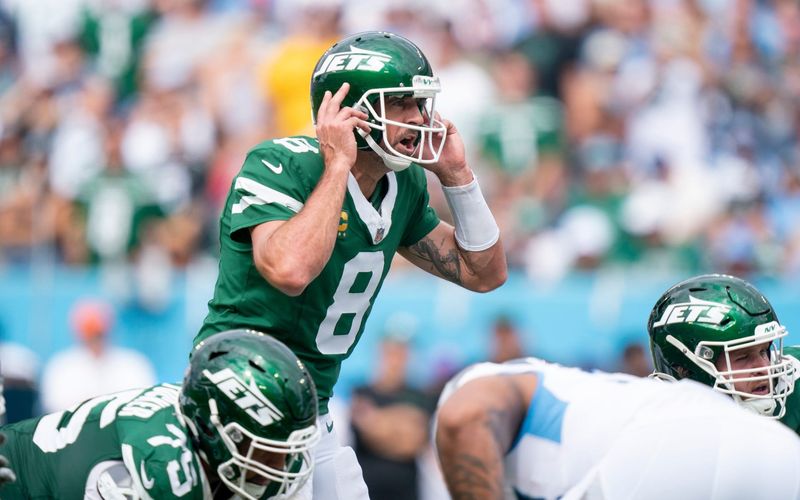 New York Jets quarterback Aaron Rodgers (8) calls a play against the Tennessee Titans during their game at Nissan Stadium in Nashville, Tenn., Sunday, Sept. 15, 2024.
