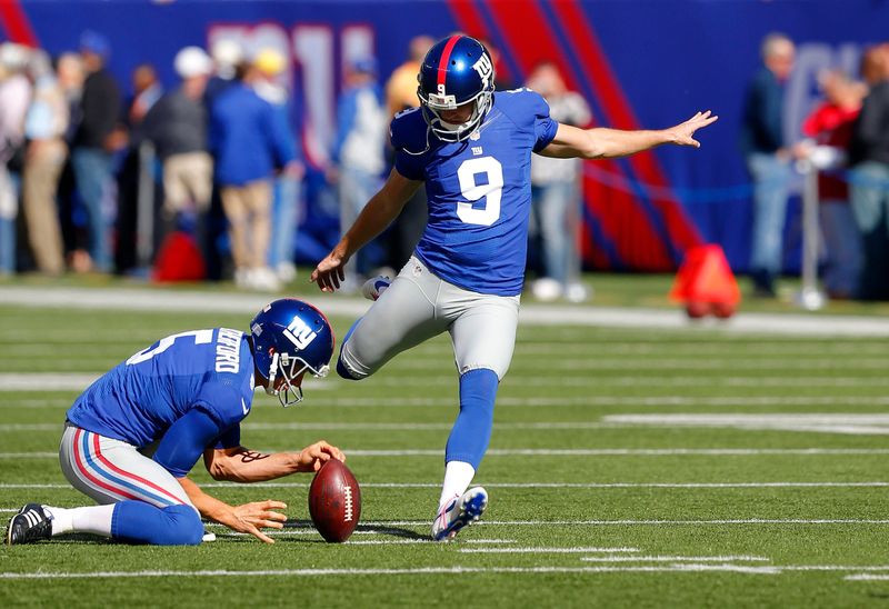Oct 21, 2012; East Rutherford, NJ, USA; New York Giants kicker Lawrence Tynes (9) prior to the game against the Washington Redskins at MetLife Stadium. Mandatory Credit: Jim O'Connor-USA TODAY Sports