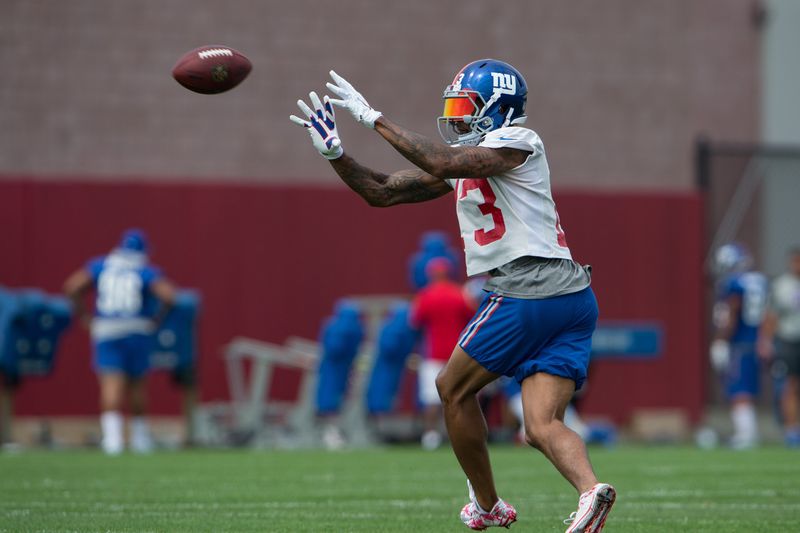 Jul 30, 2016; East Rutherford, NJ, USA; New York Giants wide receiver Odell Beckham (13) catches the ball at Quest Diagnostics Training Center. Mandatory Credit: William Hauser-USA TODAY Sports
