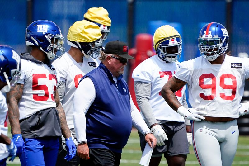 New York Giants defensive coordinator Don "Wink" Martindale walks on the field with the defense during mandatory minicamp at the Quest Diagnostics Training Center on Tuesday, June 7, 2022, in East Rutherford.

News Giants Mandatory Minicamp