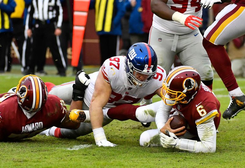 Dec 9, 2018; Landover, MD, USA; New York Giants defensive end Josh Mauro (97) sacks Washington Redskins quarterback Mark Sanchez (6) during the second half at FedEx Field. Mandatory Credit: Brad Mills-USA TODAY Sports
