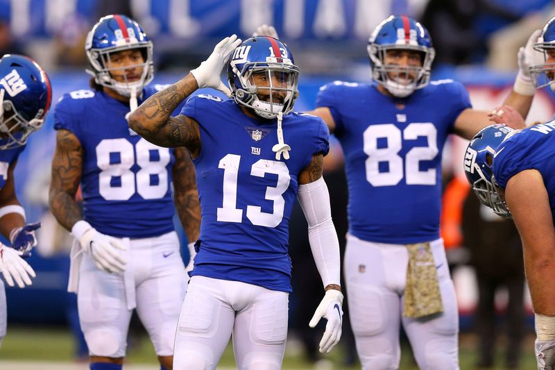 Nov 18, 2018; East Rutherford, NJ, USA; New York Giants wide receiver Odell Beckham (13) signals to fans during the second half against the Tampa Bay Buccaneers at MetLife Stadium. Mandatory Credit: Vincent Carchietta-USA TODAY Sports
