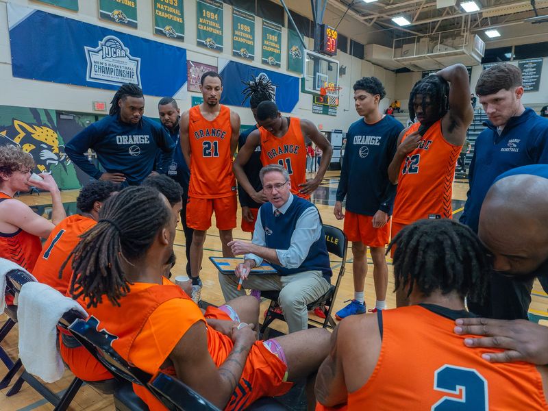 SUNY Orange head coach Tom Rickard speaks to his team during a break in the NJCAA Div. II men's basketball tournament second-round game in Danville, Ill., on March 18, 2025. North Central Missouri beat SUNY Orange 99-81. NJCAA