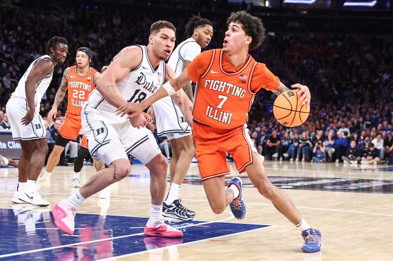 Feb 22, 2025; New York, NY, USA; Illinois Fighting Illini forward Will Riley (7) drives past Duke Blue Devils forward Mason Gillis (18) in the second half at Madison Square Garden. Mandatory Credit: Wendell Cruz-Imagn Images