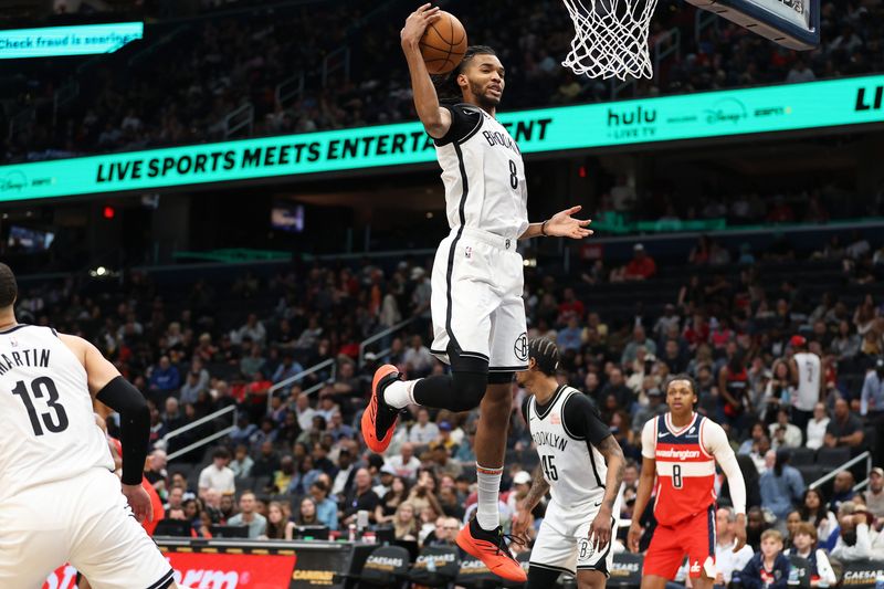 Mar 29, 2025; Washington, District of Columbia, USA; Brooklyn Nets forward Ziaire Williams (8) grabs a rebound during the second half against the Washington Wizards at Capital One Arena. Mandatory Credit: Daniel Kucin Jr.-Imagn Images