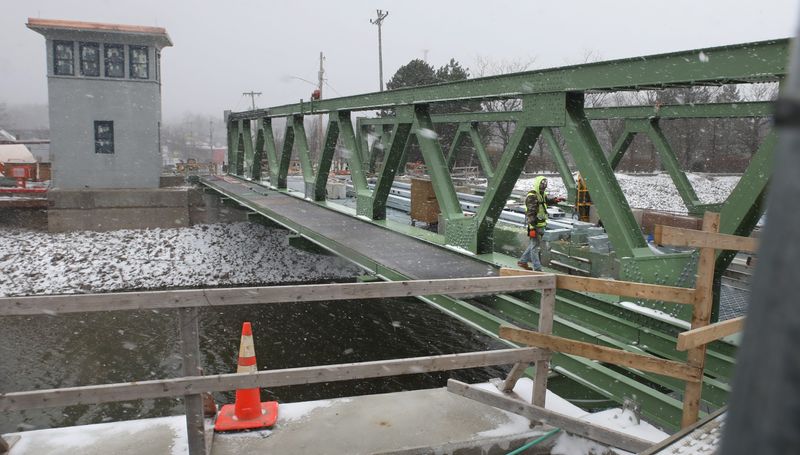 Construction continues on the Main Street bridge that spans the Erie Canal in downtown Brockport Tuesday, April 8, 2025.