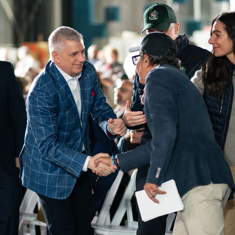 Oneida County Executive Anthony Picente Jr. shakes hands with Chobani CEO Hamdi Ulukaya in this O-D file photo from the ceremonial groundbreaking for a new Chobani plant on the county-owned Triangle Site at Griffiss Business and Technology Park in Rome on April 22, 2025. Oneida County is doing site and infrastructure work on the Triangle Site and nearby roads while the plant is under construction.