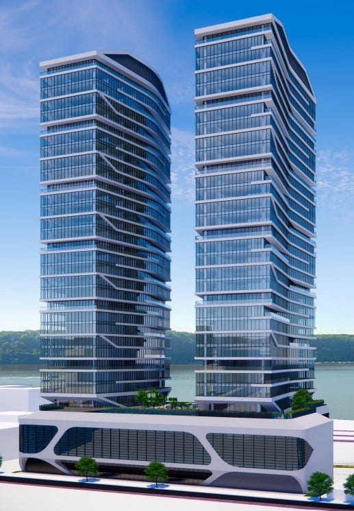 A rendering of two 32-story residential towners proposed at 143 Woodworth Ave. in Yonkers