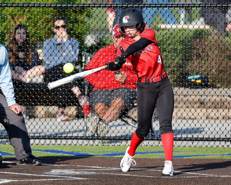 Penfield’s Ella Maley hits a triple against Schroeder in a 9-0 Patriots win.