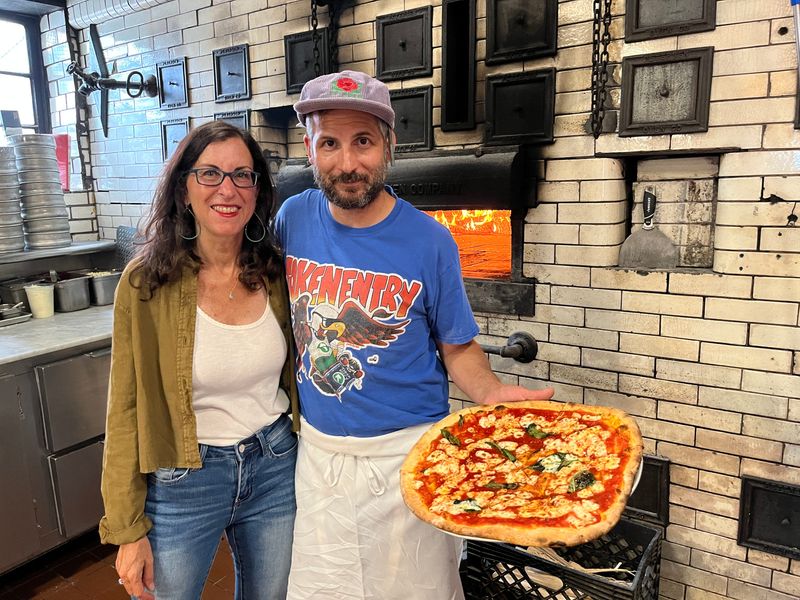 Lohud food reporter Jeanne Muchnick with owner/chef is Matt Di Gesu and his Margherita pizza at Pizzeria La Rosa in New Rochelle August 10, 2023.