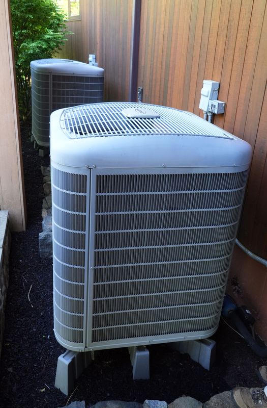 Shown are two of three heat pumps used for heating and cooling a home in Croton-on-Hudson in May 7, 2025.