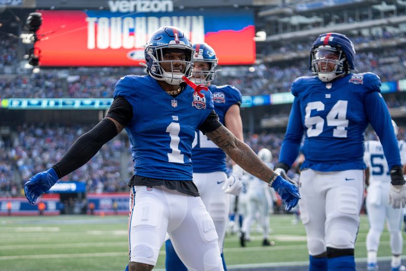 New York Giants wide receiver Malik Nabers (1) celebrates with his teammates after scoring a touchdown during a game between New York Giants and Indianapolis Colts at MetLife Stadium on Sunday, Dec. 29, 2024.