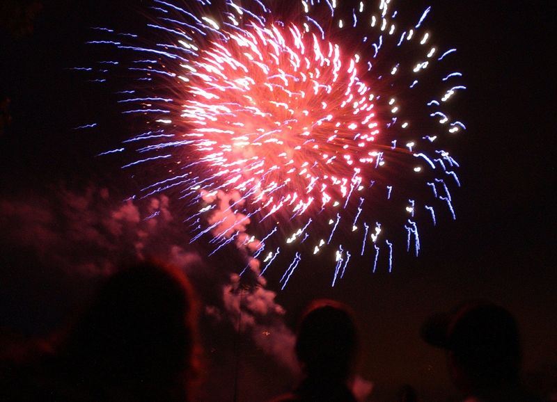 Red, white and blue fireworks light up the sky during an Independence Day celebration in Scolpino Park in Brewster July 3, 2005.( Angela Gaul / The Journal News )