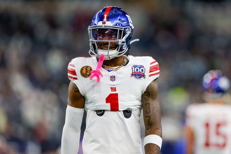 Nov 28, 2024; Arlington, Texas, USA; New York Giants wide receiver Malik Nabers (1) warms up prior to the game against the Dallas Cowboys at AT&T Stadium. Mandatory Credit: Andrew Dieb-Imagn Images