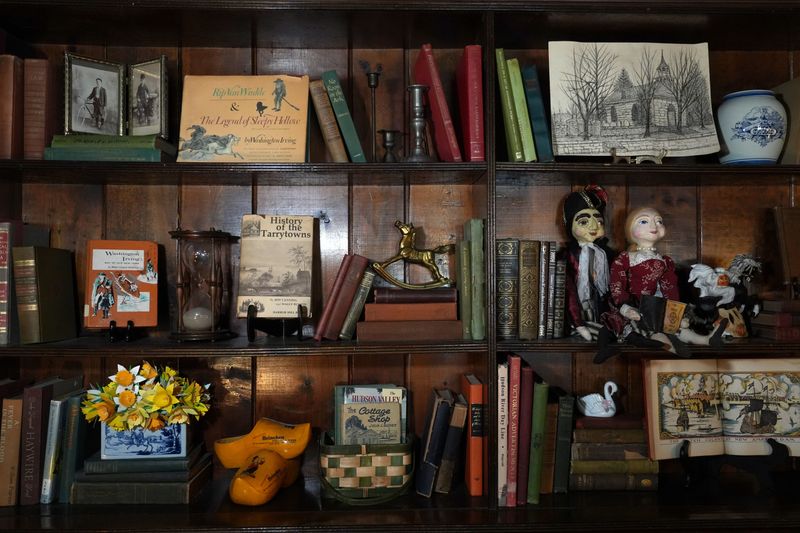 Books with Hudson Valley ties and assorted knickknacks are displayed at Horsefeathers in Tarrytown May 15, 2025.