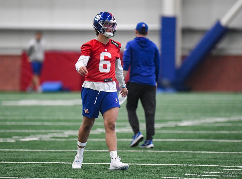 May 9, 2025; East Rutherford, NJ, USA; New York Giants quarterback Jaxson Dart (6) participates in a drill during rookie minicamp at Quest Diagnostics Training Center. Mandatory Credit: John Jones-Imagn Images