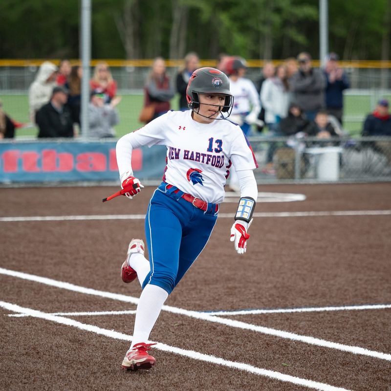 New Hartford's Lexi Mungari rounds first base during the quarterfinals of Section III 2025 Class A playoffs at Accelerate Sports Complex.