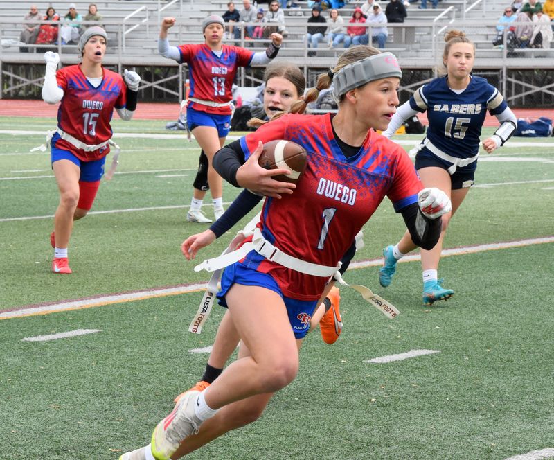 Owego Free Academy's Ashlyn Dalton (1) picks up a big gain as the River Hawks beat Susquehanna Valley, 44-6, in the Section 4 Class C girls flag football championship game May 24, 2025 at Union-Endicott High School.