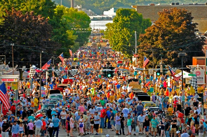 Crowds fill a past Grand Prix Festival in Watkins Glen, Schuyler County. The county lost the most in relative population (-5.41%) in the state between 2020 and 2025, according to a Cornell analysis.