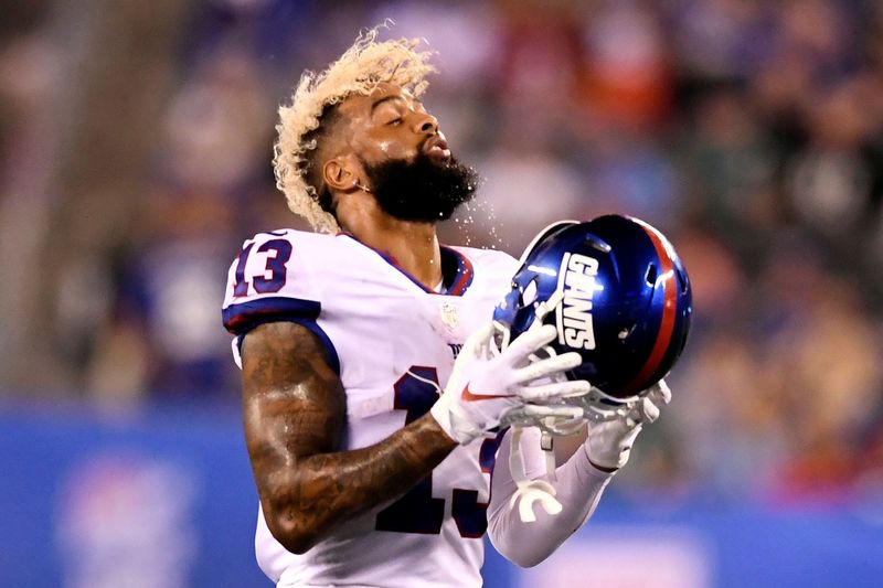 New York Giants wide receiver Odell Beckham Jr. (13) puts his helmet on in the second half. The New York Giants face the Philadelphia Eagles on Thursday, Oct. 11, 2018, in East Rutherford.

Nyg Vs Phi