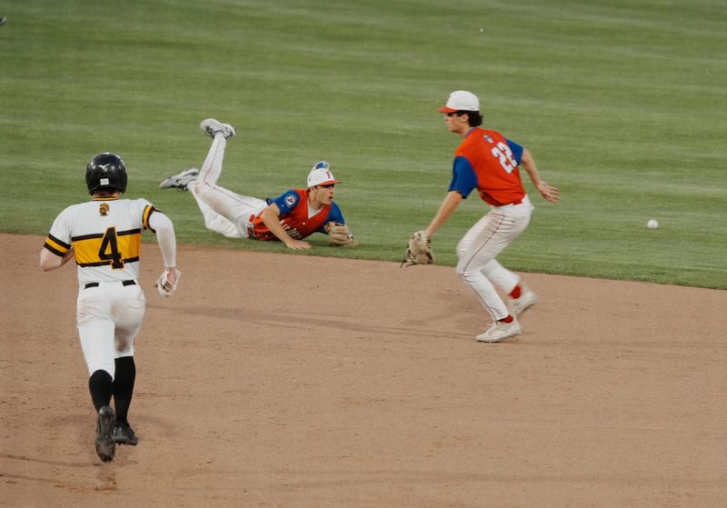 Fairport’s Jonathan Roessel stretches for the grounder missing it while his teammate, Nicholas Rene, moves to cover second base as McQuaid’s William McCarty heads towards it during their Section V championship game at Innovative Field on June 2, 2025.