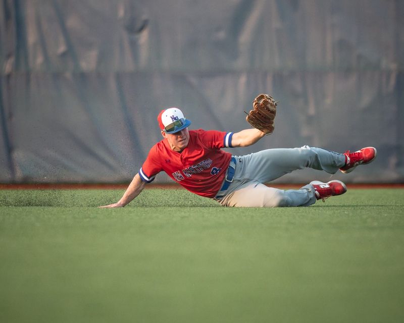 New Hartford's Peyton Way slides to grab the ball during the finals of the 2025 Section III Class A Championships at Onondaga Community College in Syracuse, NY on Monday, June 2, 2025.