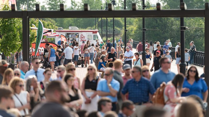 Many people gathered for the grand opening of Harbor Point in Utica, NY on Thursday, June 5, 2025 to enjoy a community-wide, family-friendly celebration along the waterfront, with local entertainment, food, and attractions.