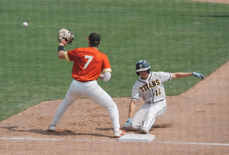 Webster Thomas Trevor LeRoy gets back to first base safely after the pitcher tried to catch him off the base during their state quarterfinal game held at Innovative Field in Rochester on June 7, 2025. Covering first base for Williamsville East is Jake Stanfield.