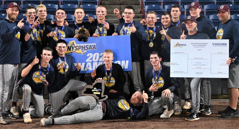 Coaches and players from Oriskany pose after winning New York's Class D baseball championship game against North Warren Saturday at Mirabito Stadium in Binghamton.