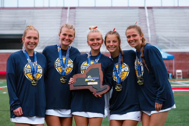 Penfield players, from left, Jenna Capozzi, Aleah Petre, Aly Welz, Eliza Torres and Emma Alexander pose with the NYSPHSAA championship plaque after defeating Suffern in the Class A final Saturday, June 14 at SUNY Cortland.