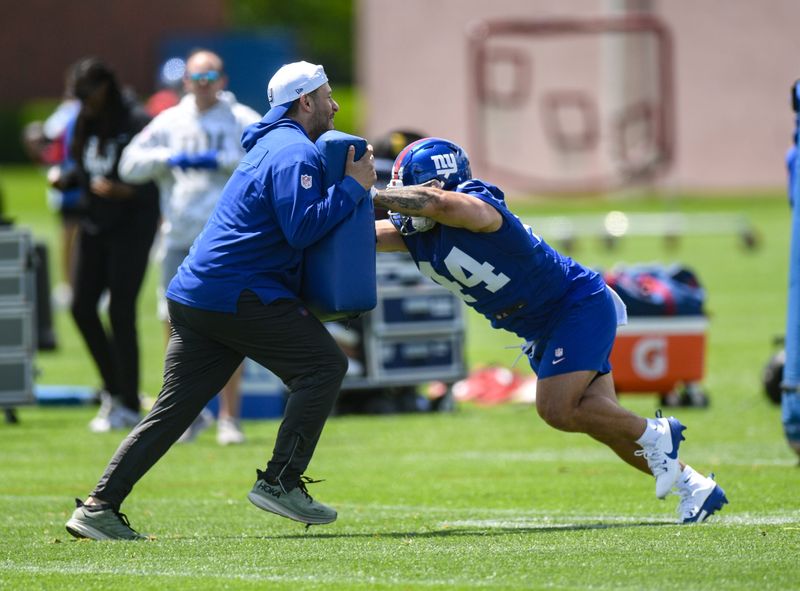 May 10, 2025; East Rutherford, NJ, USA; New York Giants running back Cam Skattebo (44) participates in a drill during rookie minicamp at Quest Diagnostics Training Center. Mandatory Credit: John Jones-Imagn Images