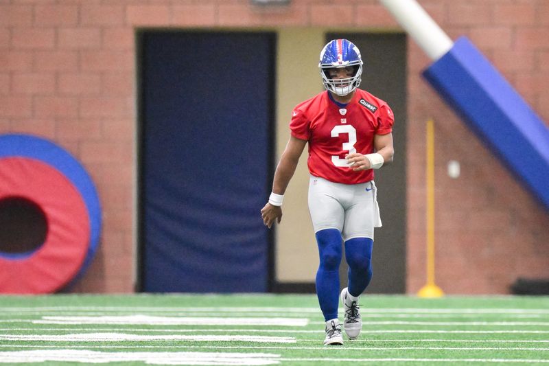 Jun 17, 2025; East Rutherford, NJ, USA; New York Giants quarterback Russell Wilson (3) warms up during minicamp at Quest Diagnostics Training Center. Mandatory Credit: John Jones-Imagn Images