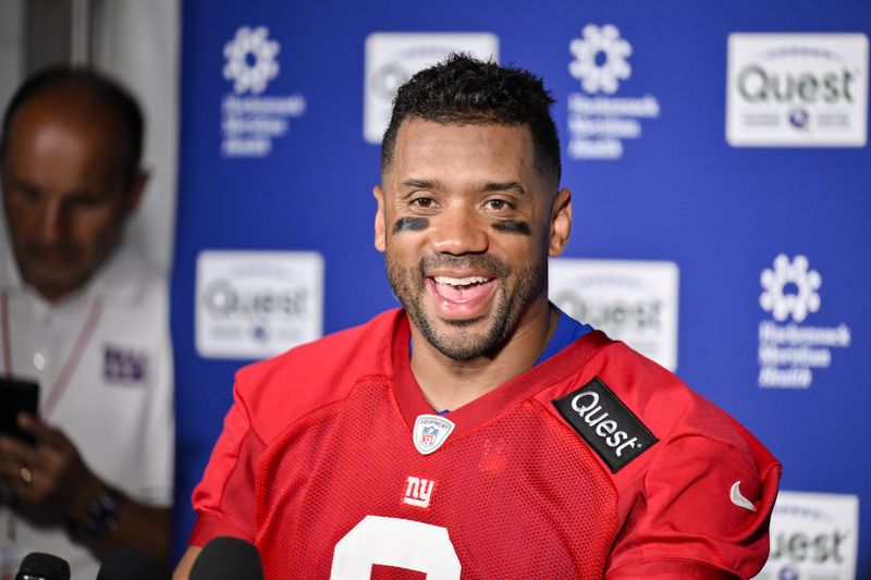 Jun 17, 2025; East Rutherford, NJ, USA; New York Giants quarterback Russell Wilson (3) speaks at a press conference during minicamp at Quest Diagnostics Training Center. Mandatory Credit: John Jones-Imagn Images
