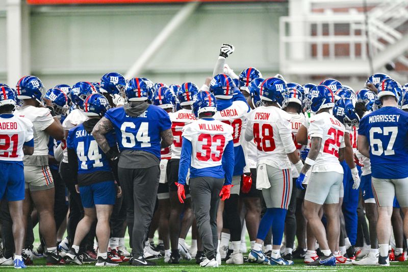 Jun 18, 2025; East Rutherford, NJ, USA; New York Giants huddle during minicamp at Quest Diagnostics Training Center. Mandatory Credit: John Jones-Imagn Images