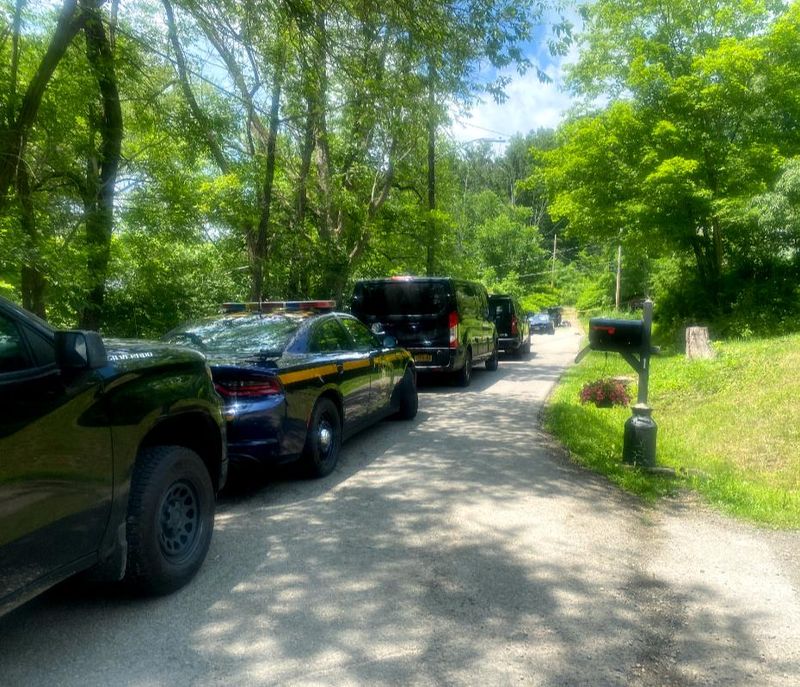 A heavy police presence remained in place on Academy Street in the Village of Addison the afternoon of Friday, June 20, 2025.