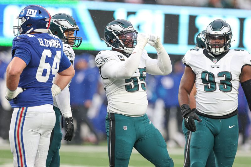 Dec 11, 2022; East Rutherford, New Jersey, USA; Philadelphia Eagles defensive end Brandon Graham (55) celebrate a defensive stop during the second half against the New York Giants at MetLife Stadium. Mandatory Credit: Vincent Carchietta-USA TODAY Sports