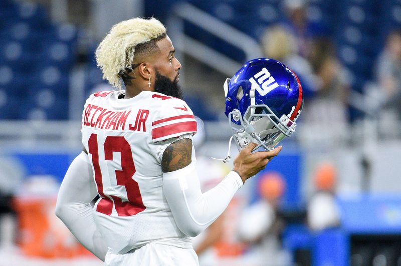 Aug 17, 2018; Detroit, MI, USA; New York Giants wide receiver Odell Beckham (13) adjusts his helmet before a game against the Detroit Lions at Ford Field. Mandatory Credit: Tim Fuller-USA TODAY Sports