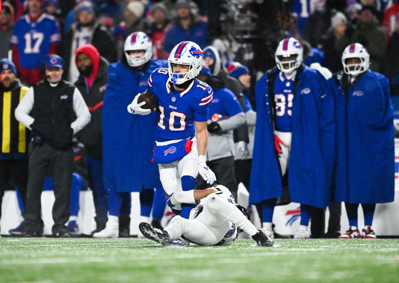 Jan 19, 2025; Orchard Park, New York, USA; Buffalo Bills wide receiver Khalil Shakir (10) makes a catch during the fourth quarter against the Baltimore Ravens in a 2025 AFC divisional round game at Highmark Stadium. Mandatory Credit: Mark Konezny-Imagn Images