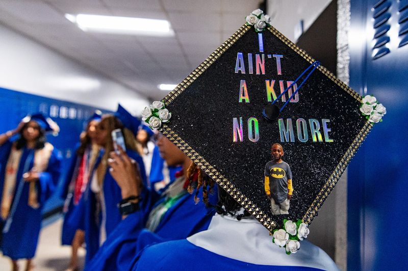 Graduate Tracey Daniels stands for a portrait showing off their mortarboard during the Poughkeepsie High School Class of 2025 Commencement ceremony at Poughkeepsie High School in Poughkeepsie, NY on Friday, June 27, 2025. Kelly Marsh/Special to the Poughkeepsie Journal