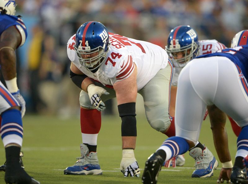 Aug 3, 2014; Canton, OH, USA; New York Giants left guard Geoff Schwartz (74) during the 2014 Hall of Fame game against the Buffalo Bills at Fawcett Stadium. Mandatory Credit: Kirby Lee-USA TODAY Sports