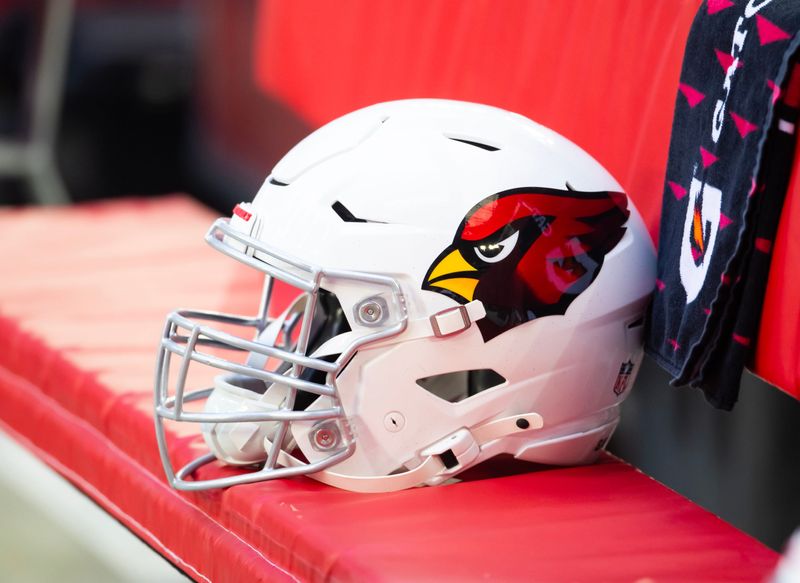 Jan 5, 2025; Glendale, Arizona, USA; Detailed view of an Arizona Cardinals helmet at State Farm Stadium. Mandatory Credit: Mark J. Rebilas-Imagn Images