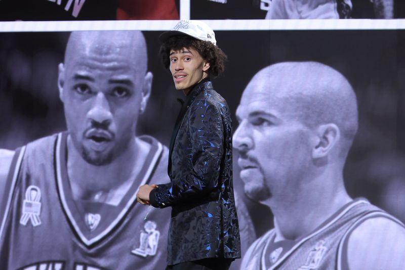 Jun 25, 2025; Brooklyn, NY, USA; Nolan Traore reacts after being selected as the 19th pick by the Brooklyn Nets in the first round of the 2025 NBA Draft at Barclays Center. Mandatory Credit: Brad Penner-Imagn Images
