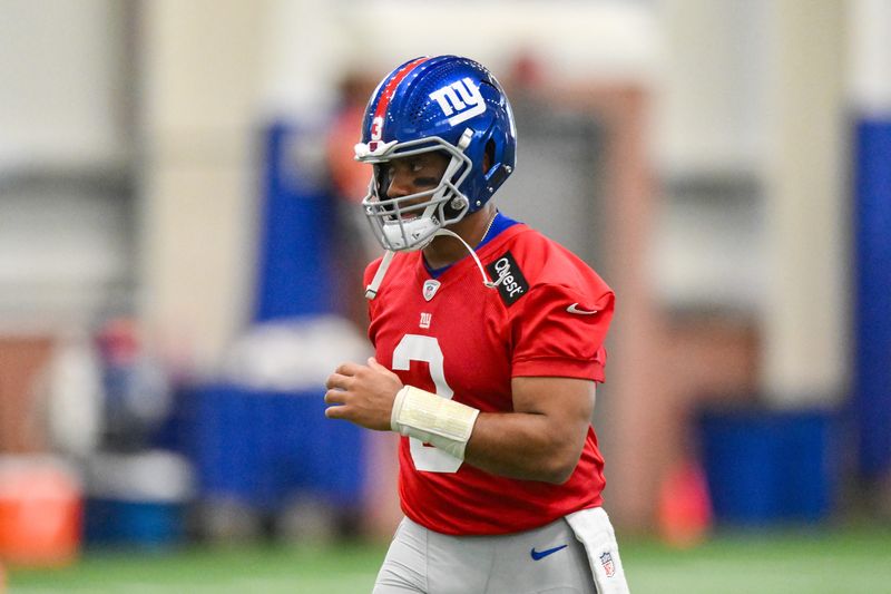 Jun 17, 2025; East Rutherford, NJ, USA; New York Giants quarterback Russell Wilson (3) warms up during minicamp at Quest Diagnostics Training Center. Mandatory Credit: John Jones-Imagn Images