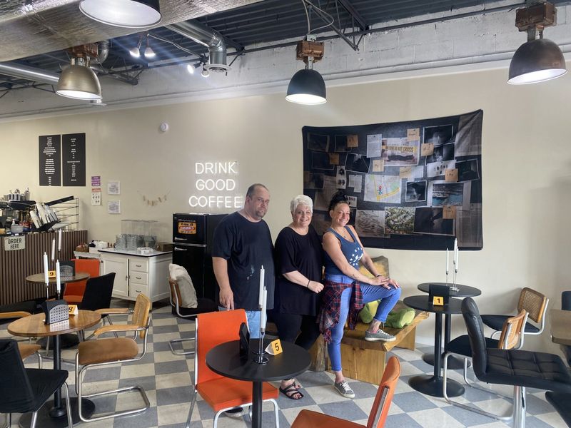 Tracy Sparks, owner of The Mug Shotz at 37 E. Pulteney St. in Corning, with employees Jessica Troccia and Jeremy Getman at the new restaurant.