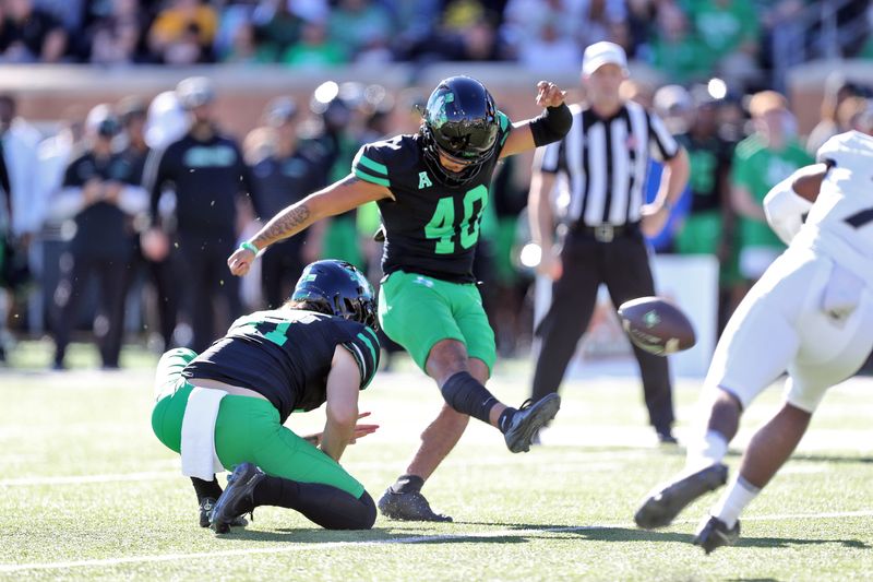 North Texas Mean Green kicker Kali Nguma kicks a field goal against the Army Black Knights.