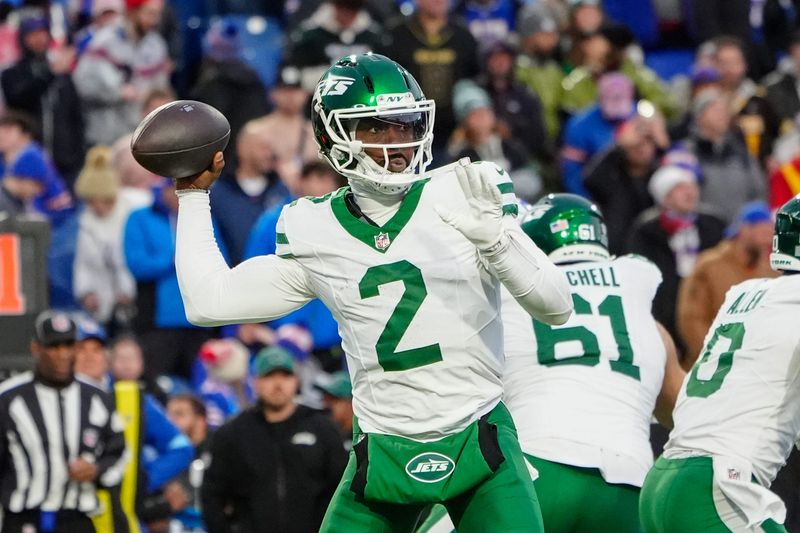 Dec 29, 2024; Orchard Park, New York, USA; New York Jets quarterback Tyrod Taylor (2) throws the ball against the Buffalo Bills during the second half at Highmark Stadium. Mandatory Credit: Gregory Fisher-Imagn Images