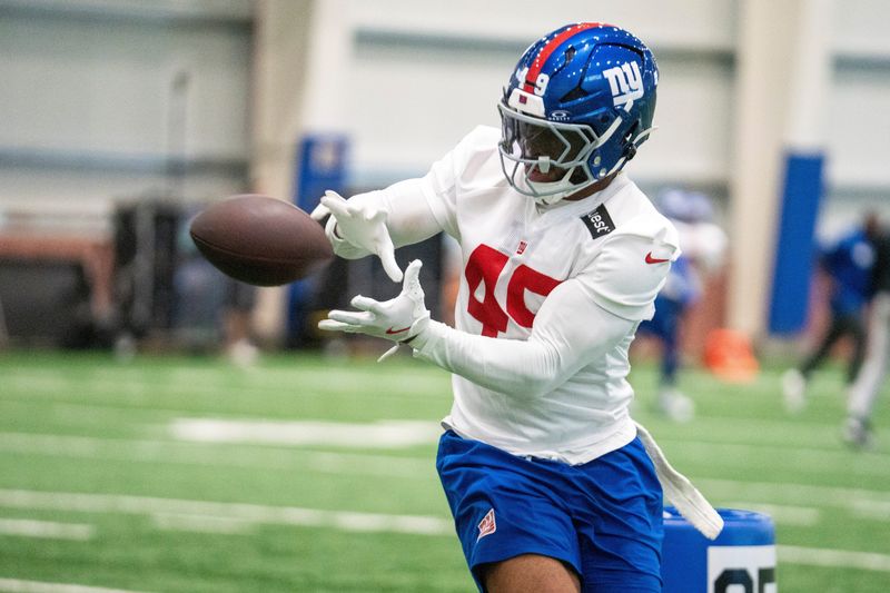 New York Giants linebacker Chris Board (49) catches a ball in a drill during Mandatory Minicamp at Quest Diagnostics Giants Training Center in East Rutherford on Tuesday, June 17, 2025.