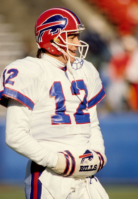Nov 19, 1989; Foxboro, MA, USA; FILE PHOTO; Buffalo Bills quarterback Jim Kelly (12) against the New England Patriots at Foxboro Stadium. The Patriots defeated the Bills 33-24.